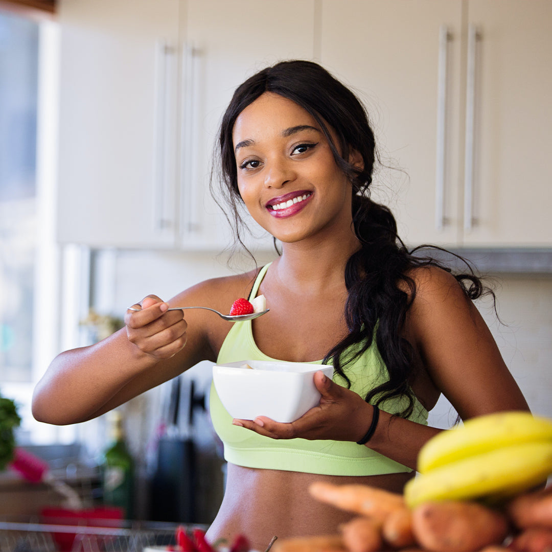 woman eating fruit