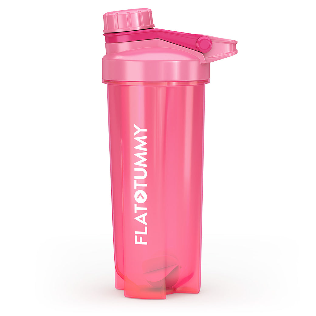 The Flat Tummy Co pink plastic shaker bottle has a matching screw-on lid and flip cap, ideal for mixing protein shakes. "FLAT TUMMY" is printed vertically in white on the side.