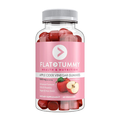 A transparent plastic bottle labeled "Flat Tummy Co Apple Cider Vinegar Gummies" contains red gummy vitamins. The label showcases features such as "1000 mg per serving," "Advanced Formula," "With B Vitamins," "Vegan & Non-GMO," and includes "60 Gummies." Enjoy the gut health benefits!