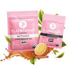 Two pink packets of Flat Tummy Tea from Flat Tummy Co. The larger packet, labeled "ACTIVATE, am," and the smaller packet, labeled "CLEANSE, pm," offer a 4-week supply of herbal supplements. Both are USDA Organic certified and are designed to detoxify the body, reduce bloating, and support metabolism.