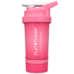 Introducing the Shaker Bottle by Flat Tummy Co, a vibrant pink plastic bottle with a white twist lid and spout. The side of the bottle is adorned with the words "FLAT TUMMY LIFESTYLE" printed vertically in white. Designed for convenience, this Shaker Bottle includes a built-in handle and a detachable bottom compartment, making it perfect for your on-the-go needs.