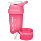 The Flat Tummy Co Shaker Bottle is a pink plastic bottle with "FLAT TUMMY LIFESTYLE" printed in white on the side. It features a white flip-top lid and comes with a detachable bottom storage compartment, both displayed next to the main bottle.